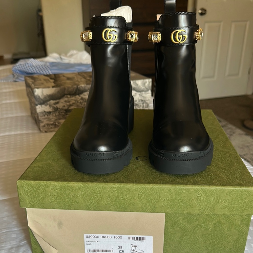 Gucci Black Boots with Gold Detailing